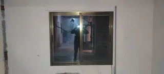 Ventana corredera con persiana