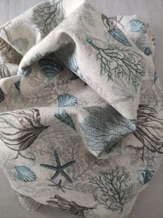 Tela loneta diseño estrellas y corales turquesa