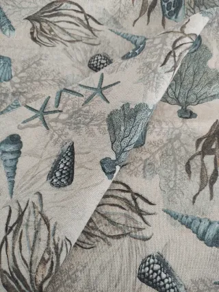 Tela loneta diseño estrellas y corales turquesa