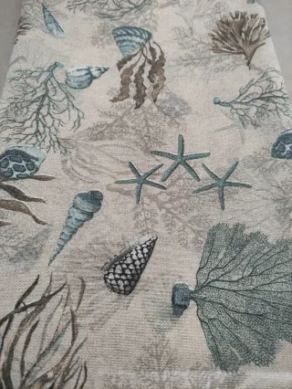 Tela loneta diseño estrellas y corales turquesa