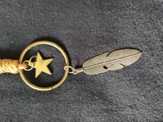 Collar largo con aro, estrella y pluma