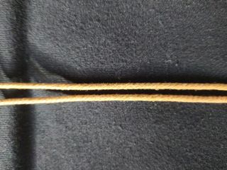 Collar largo con aro, estrella y pluma