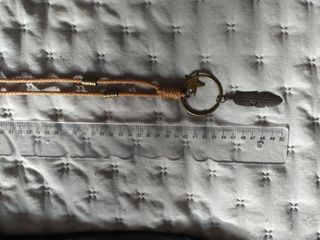 Collar largo con aro, estrella y pluma