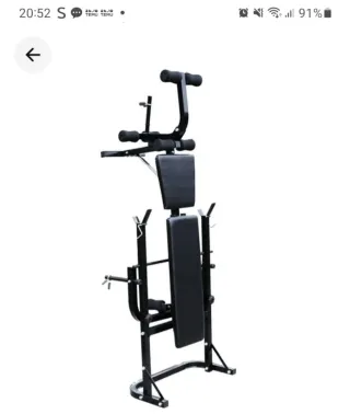 Banco de musculación con pesas
