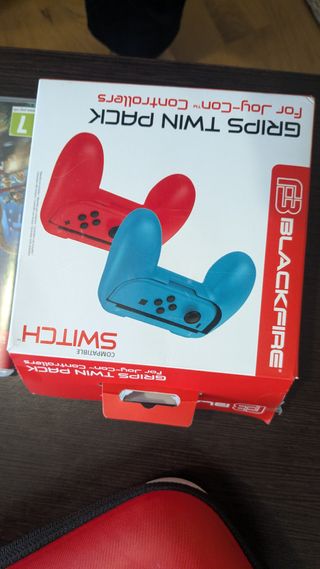 Nintendo Switch OLED + 4 giochi + accessori