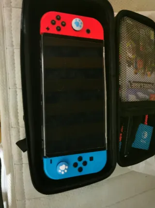 Nintendo Switch OLED blu/rosso con cover