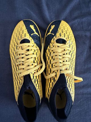 Zapatillas Puma niño/niña amarillas y negras