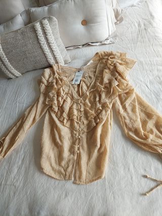 Blusa beige volantes