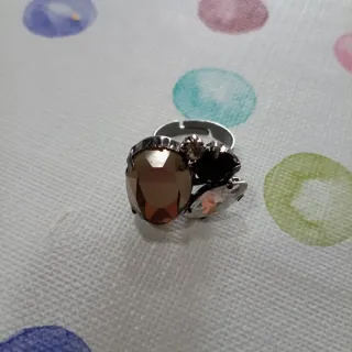 Anillo mujer piedras marrones y plateadas