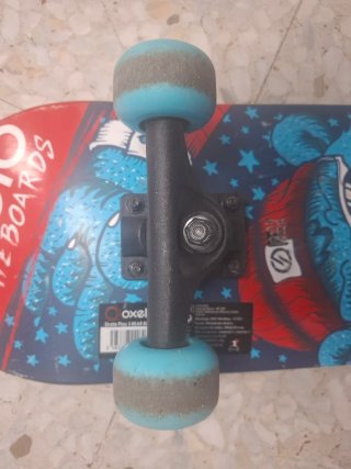 Monopatín Oxelo con diseño de mono