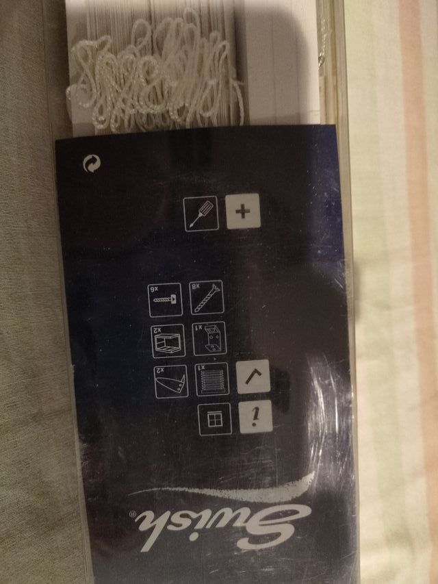 Persiana blanca de laminas