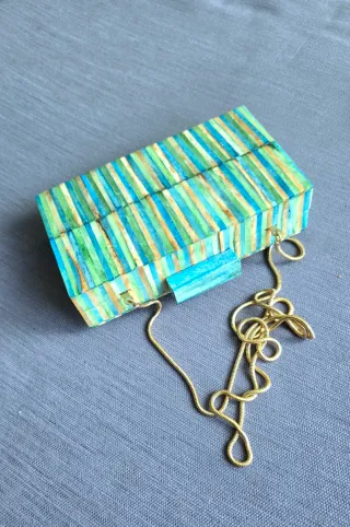 Bolso marca Mango Clutch Multicolor Rayas duro