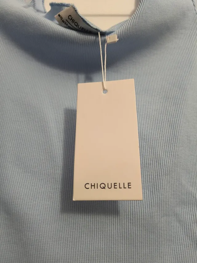 Maglietta azzurra a maniche lunghe