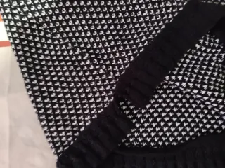 Jersey de punto blanco y negro