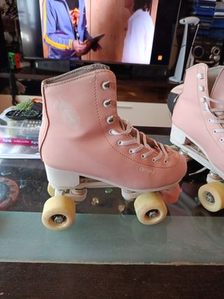 Patines de 4 ruedas color rosa con bolsa

