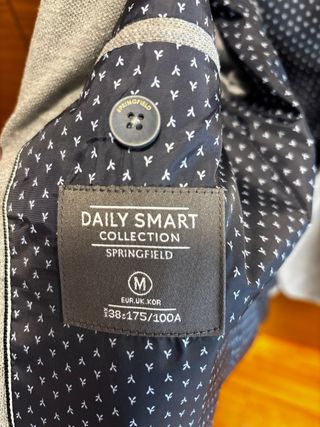 Americana gris hombre