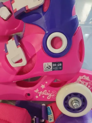 Patines rosas y morados con protecciones