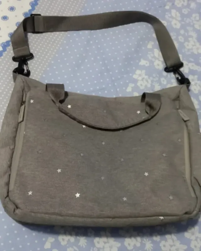 Bolso para silla de paseo gris estrellas