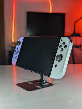 Nintendo Switch OLED viola/bianco + accessori