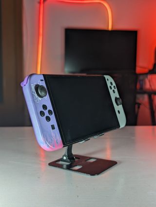 Nintendo Switch OLED viola/bianco + accessori