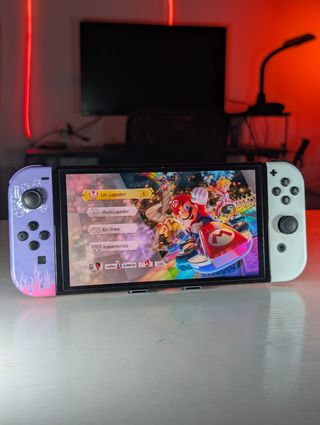 Nintendo Switch OLED viola/bianco + accessori