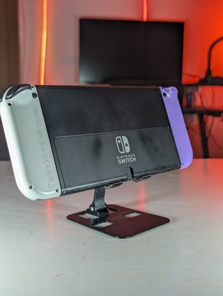Nintendo Switch OLED viola/bianco + accessori