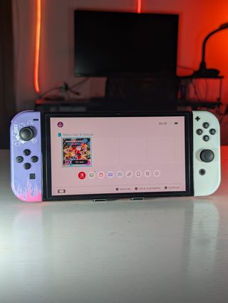 Nintendo Switch OLED viola/bianco + accessori