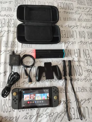 Nintendo Switch + Accesorios (m.a.g.i.a). 