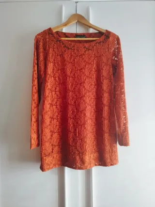 Blusa naranja manga larga transparente