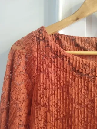Blusa naranja manga larga transparente