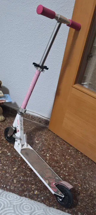 Patinete Oxelo rosa y blanco