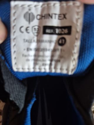 Zapatos de seguridad negros y azules