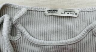 Top manga larga beige con abertura