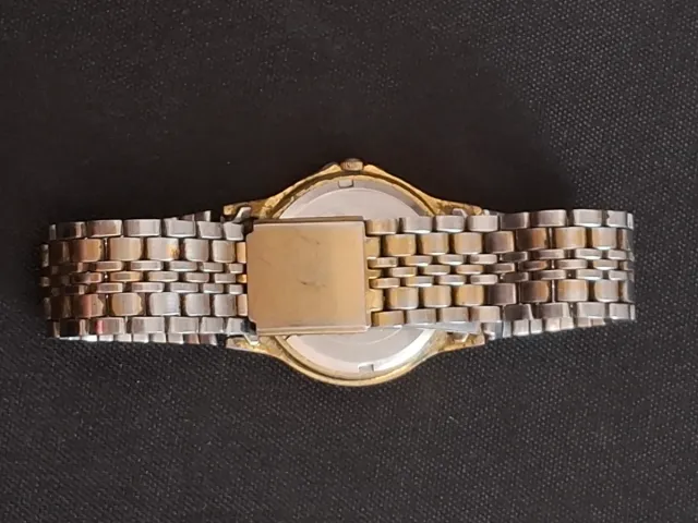 Reloj RADO Dorado y Plateado