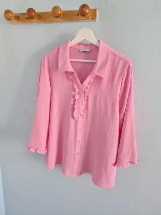 Blusa rosa con volantes