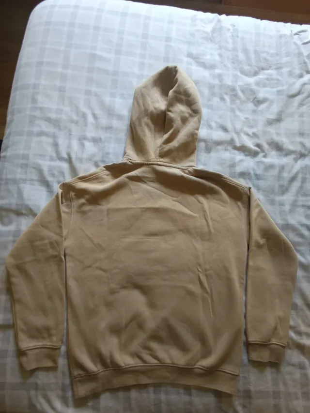 Sudadera beige con bordado de Homer Simpson