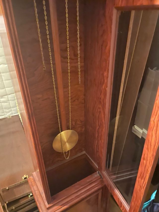 Reloj de péndulo de madera