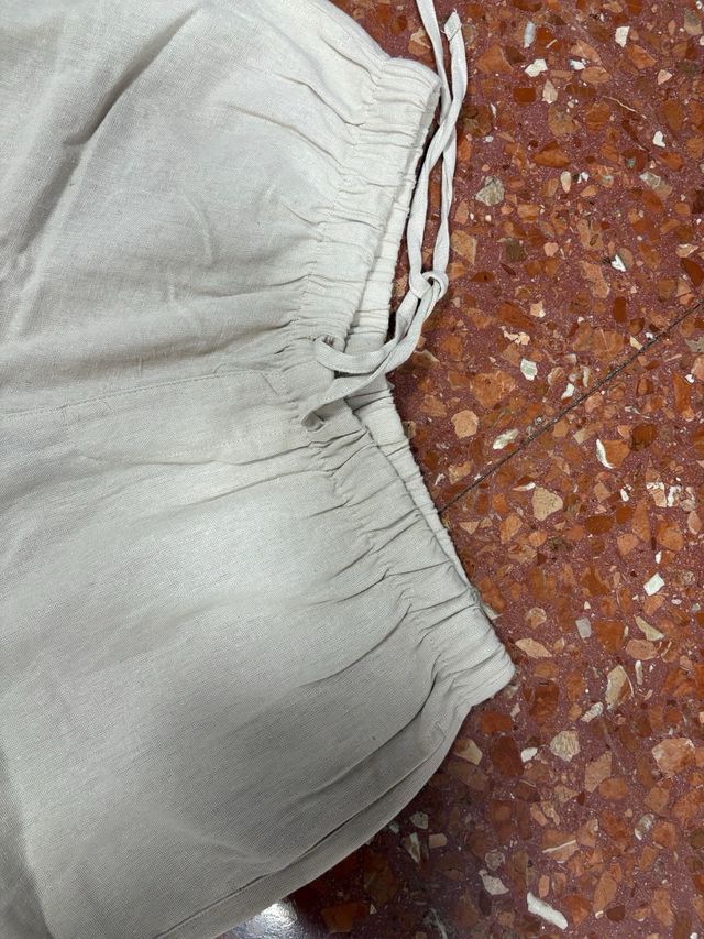 Pantalón lino crema bolsillos