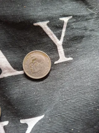 Moneda antigua con retrato