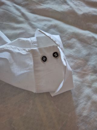 Blusa blanca botones fantasía de manga larga