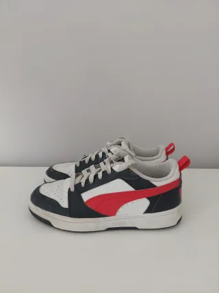 Zapatillas Puma niño Blancas negras y Rojas