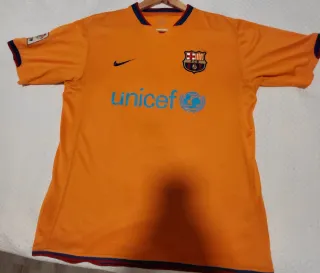 Camiseta  Barcelona Naranja primer año Messi auten