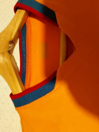 Camiseta  Barcelona Naranja primer año Messi auten