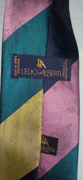 Corbata de rayas azul, oro, rosa y verde