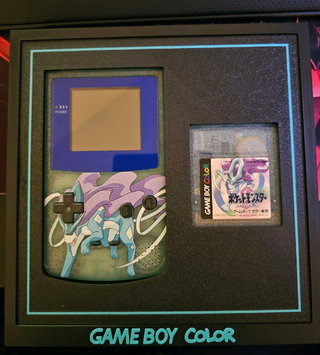 Expositor Game Boy Color + Juego Pokémon