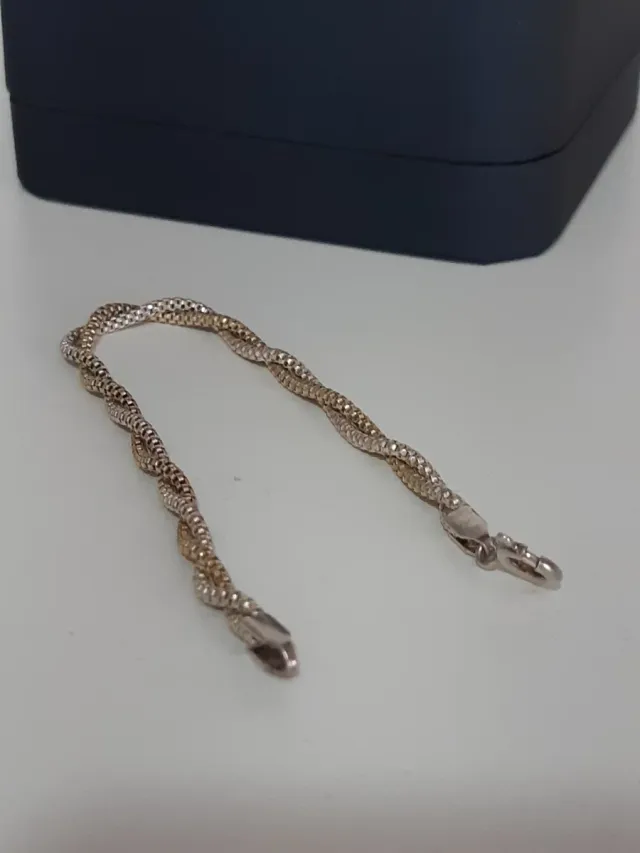 Pulsera de plata trenzada bicolor