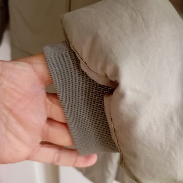 Abrigo verde Zara con capucha