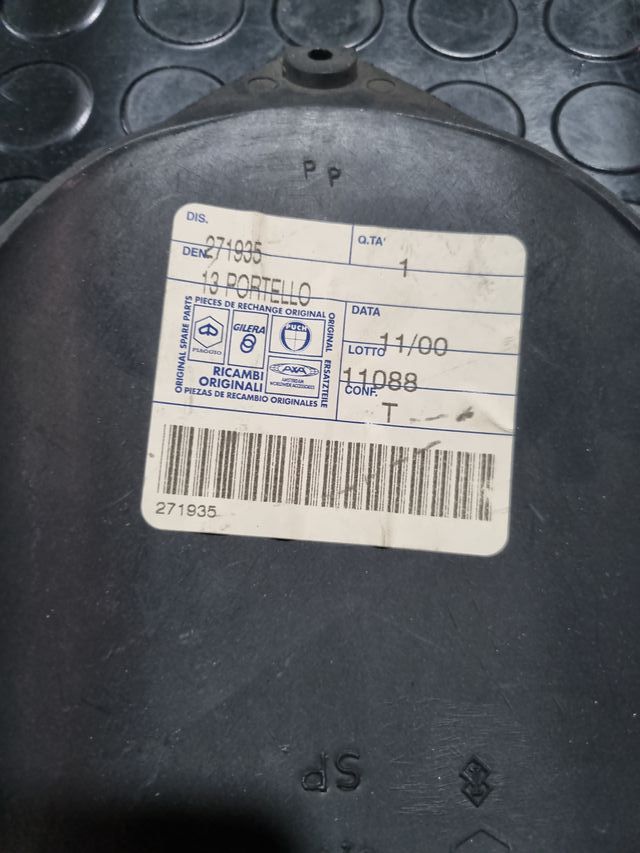 Tapa acceso carburador Piaggio Zip Sp
