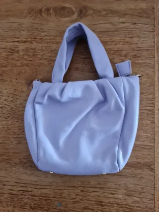 Bolso lila pequeño