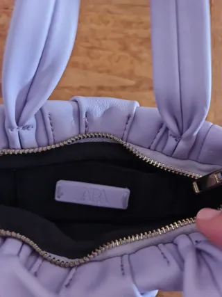 Bolso lila pequeño